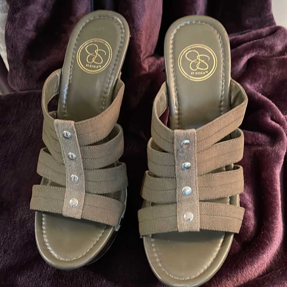 By Jessica- Olive Green, silver studded strap, 4 1/2” heal. Worn once.